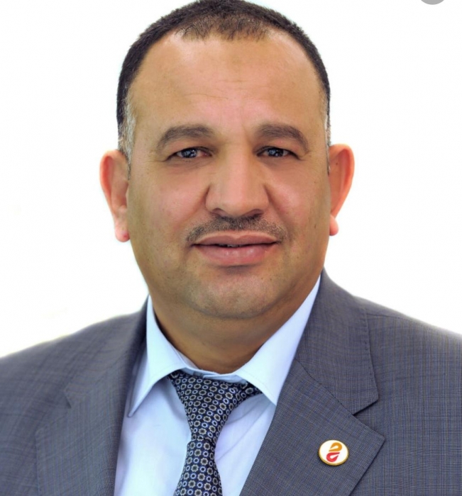 رجل الأعمال رائد ناصر الدين يهنئ مدير عام البنك الإسلامي الأردني الدكتور  حسين سعيد