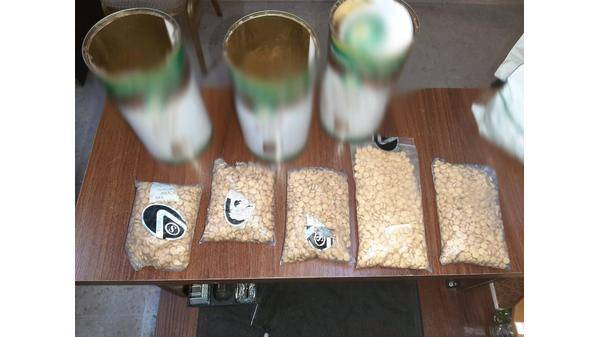 أحباط تهريب حبوب مخدرة أخفيت داخل عبوات قهوة والقبض على الفاعل