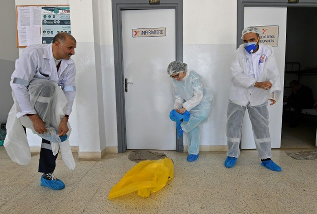 Tunis warns rule breaking virus carriers face manslaughter charge