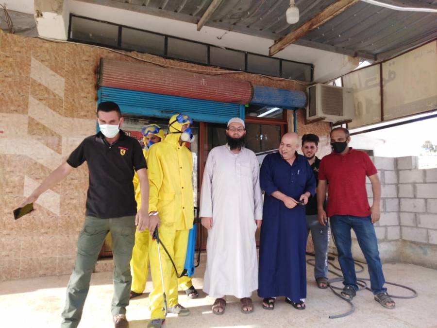 مديرية قضاء وبلدية منشية بني حسن تنفذان حملة تعقيم لمحال تجارية