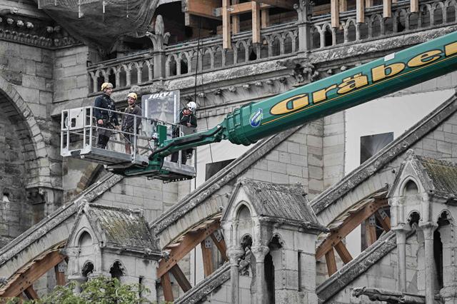 NotreDame workers start removal of firedamaged scaffolding