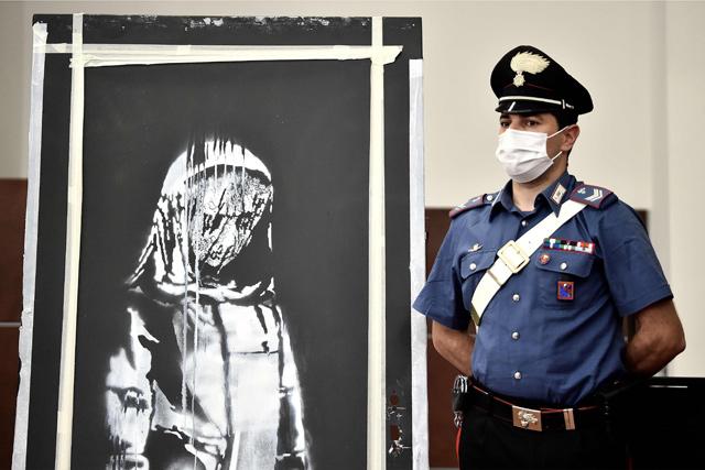 France arrests six over Banksy artwork stolen from Bataclan