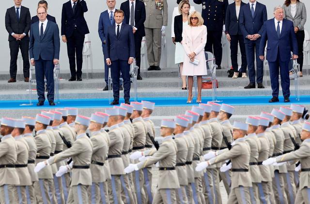 Macron hosts downsized Bastille Day, to outline crisis response plans