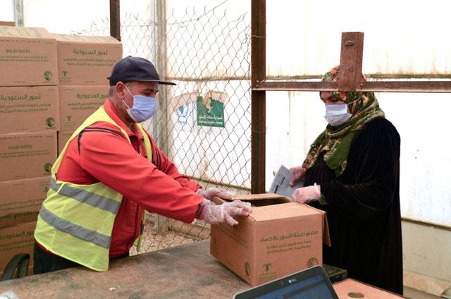 WFP, KS Relief distribute dates to 236,000 Syrian refugees, vulnerable Jordanians