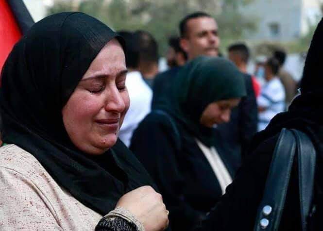 دموع فلسطينيه على شهيد الجيش العربي