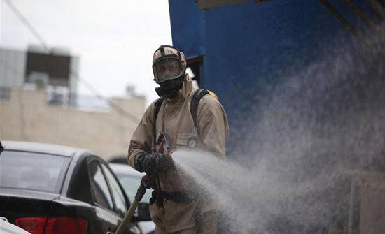 تعقيم منزل بعد ظهور إصابة كورونا في الكرك