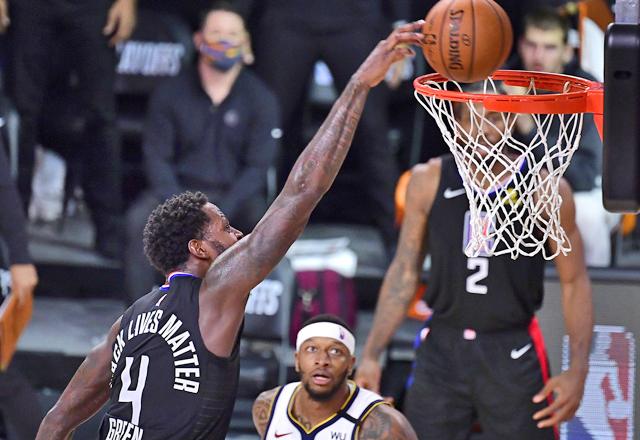 Underdog Nuggets stun Clippers in NBA game seven, Heat edge Celtics opener