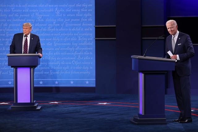 Biden faces down raging Trump in chaotic debate