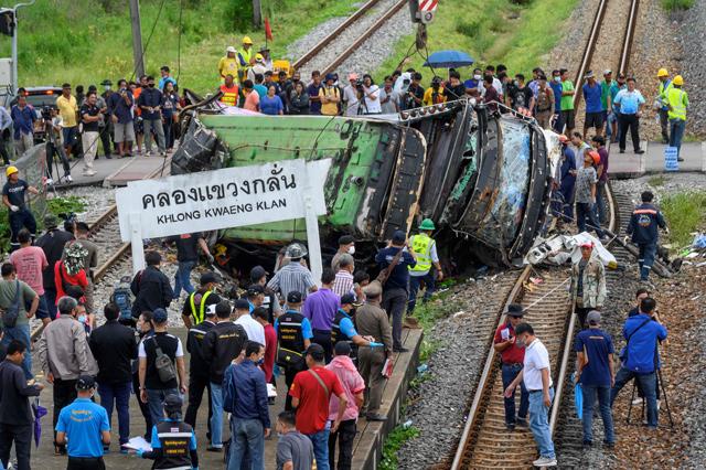 18 dead in Thailand bustrain collision