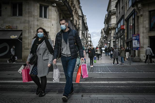 Europe faces tougher virus curbs as global cases hit daily record