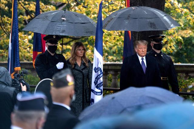 On day meant for unity, Trump and Biden attend separate Veterans Day events