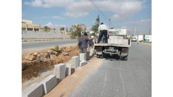 بلدية معان تواصل صيانة الطرق والإنارة في أحياء المدينة