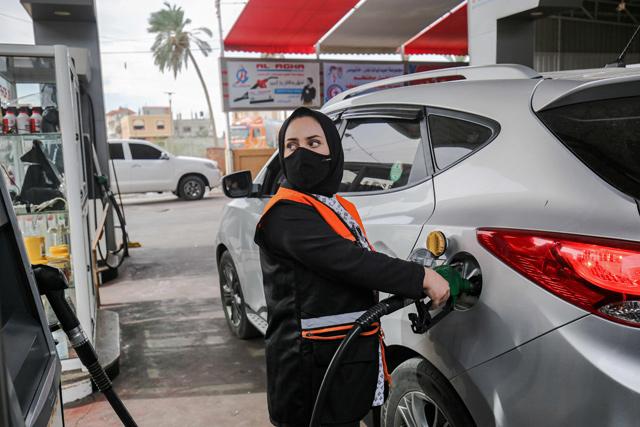 Gaza’s first female gas station attendant challenges ‘traditions’