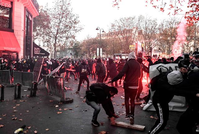 French police risk charges over black man’s beating after clashes