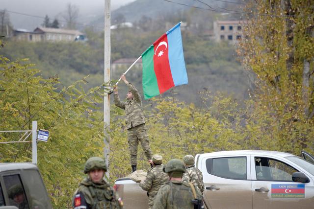 Azerbaijani forces raise flag in last district handed back by Armenia