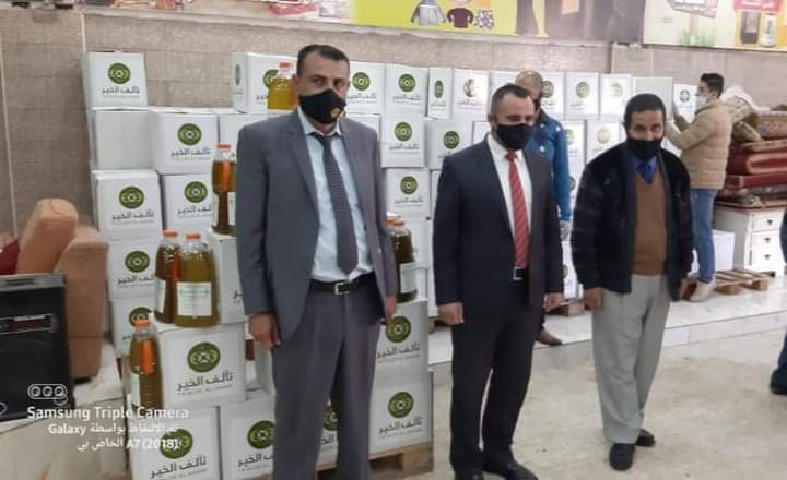 الدحادحه يحضر توزيع طرود غذائية  على الأسر المنتفعة في اربد