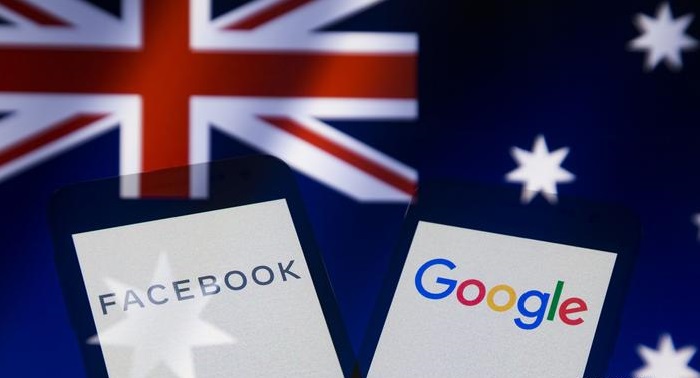 Australia unveils laws to make Google, Facebook pay for news