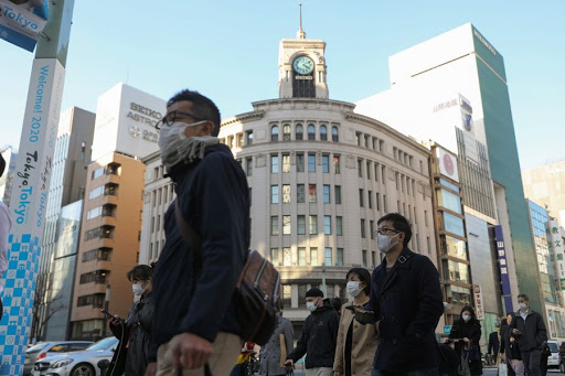 Japan suspends entry of nonresident foreigners amid concerns over new virus strain