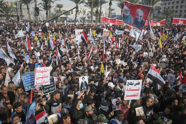 AntiUS chants as Iraqis mourn commanders killed a year ago