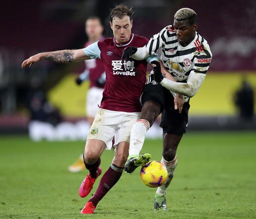 Pogba takes Man United top with win at Burnley