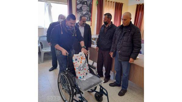 الطفيلة: توزيع معينات حركية على ذوي الإعاقة وكبار السن