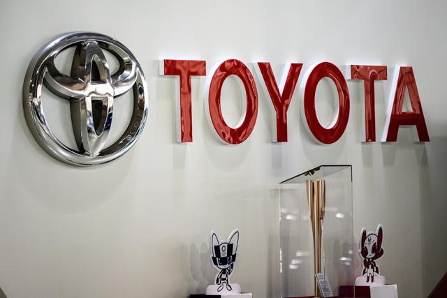 Toyota says Q3 net profit soared, hikes fullyear outlook