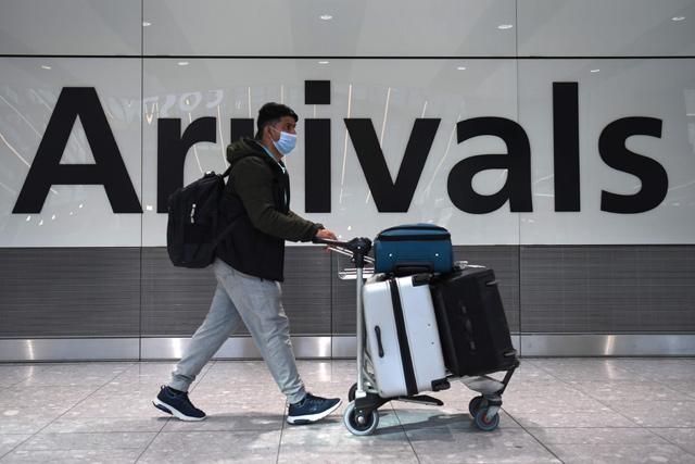 UK tightens virus controls as New Zealand hunts source of outbreak