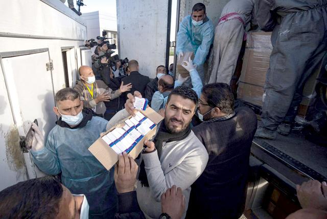 Thousands of COVID vaccines from UAE arrive in Gaza