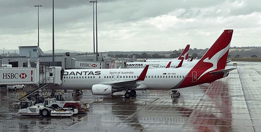 Qantas posts big losses, says no international flights until October