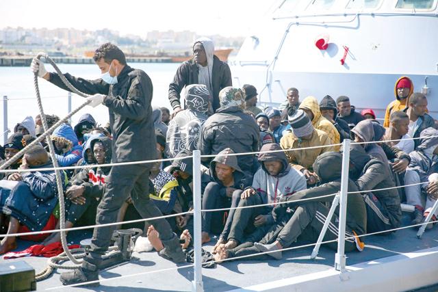 Almost 100 migrants rescued off Libya, 20 missing