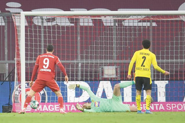 Lewandowski hattrick tops Haaland double as Bayern beat Dortmund