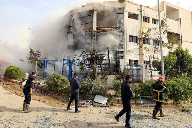 At least 20 dead in Egypt clothing factory fire