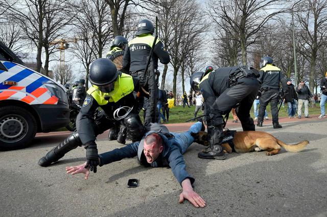 Dutch police break up antigovernment protest on election eve