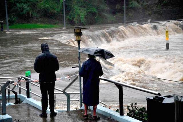 Record rains, flooding prompt evacuations in Australia