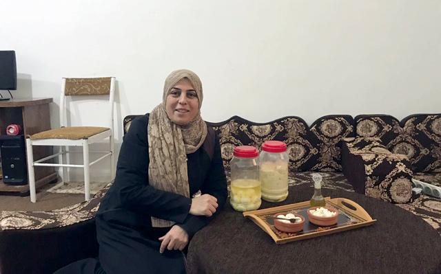 Despite all complexities, Syrian woman develops her dairy product business