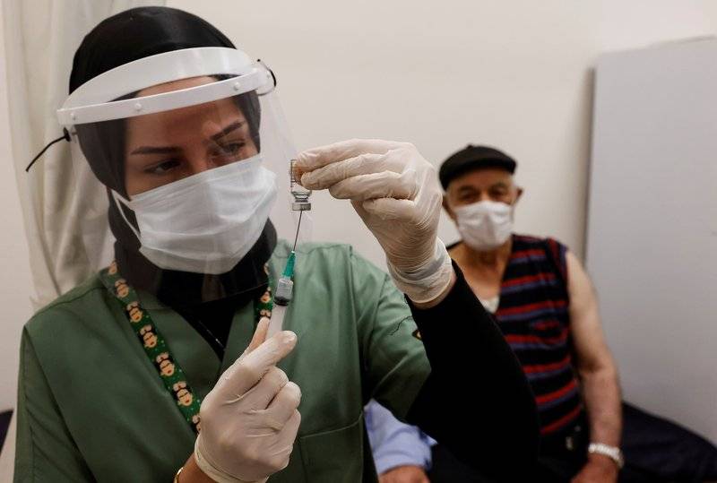 12.02 نسبة فحوصات كورونا الايجابية الخميس