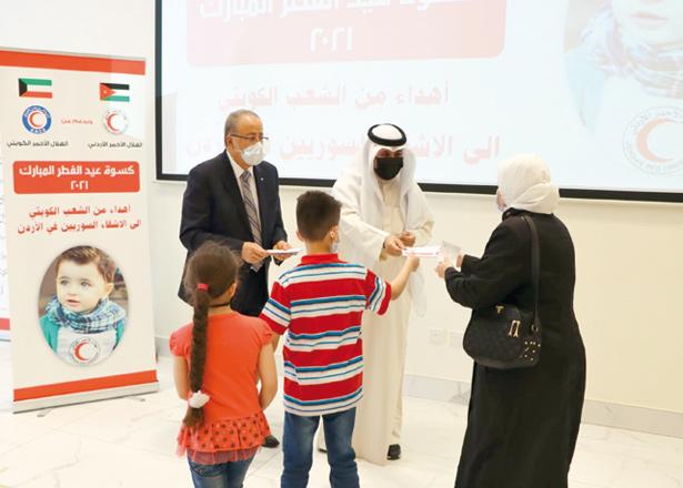 JNRCS, Kuwaiti Red Crescent distribute ‘Eid clothing’ cards to Syrian families