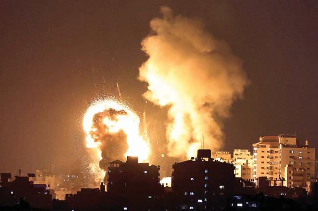 Twenty killed as Israel strikes Gaza after Hamas rocket barrage