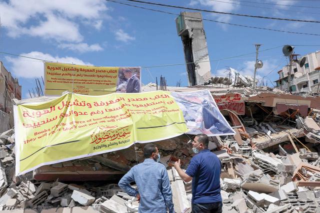 Gaza bookshop owners dreams buried under the rubble