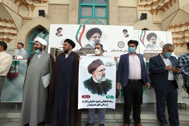 Iran ultraconservative headed for presidency as poll rivals pull out