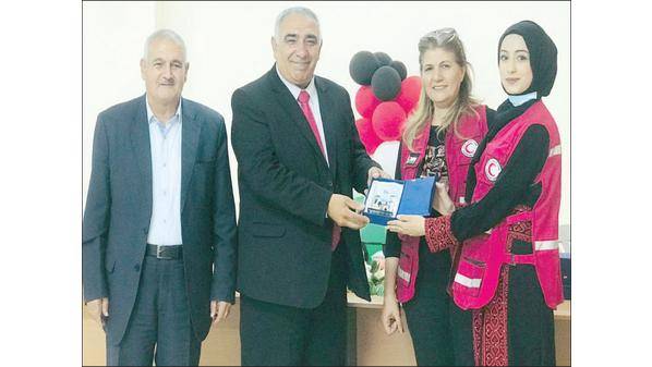 تكريم متطوعين ومتطوعات فـي الـهـلال الأحـمـر بـعـجـلـون