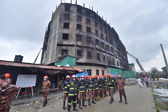 Bangladesh factory owner held after 52 die in fire