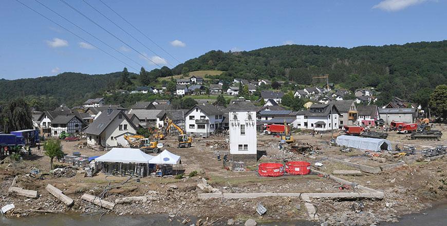 Merkel sees surreal wreckage as Europe flood death toll tops 180