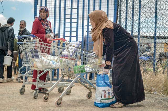 ‘Canadian government funding averts food assistance cuts to 110,000 refugees in Jordan’