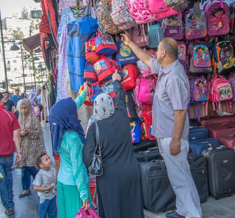 Demand for school supplies low as parents await paycheques