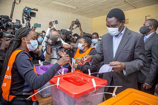 Debtridden Zambia votes in closely contested, democracytesting polls