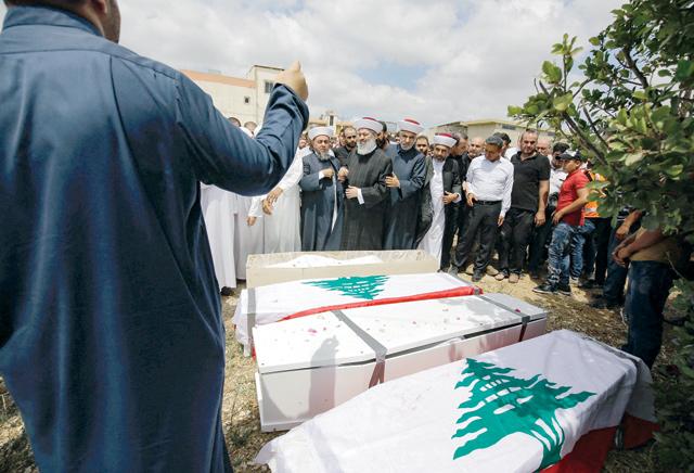 Lebanon buries victims of fuel tank blast