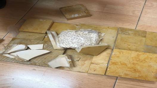 ضبط 60 ألف حبة مخدرة بشقة مهجورة في عمان