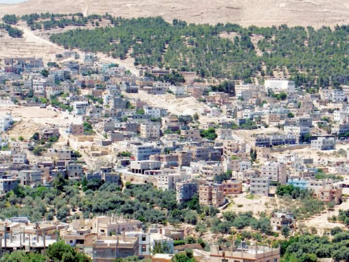 صيانة لمجاري السيول وتصريف المياه في الطفيلة