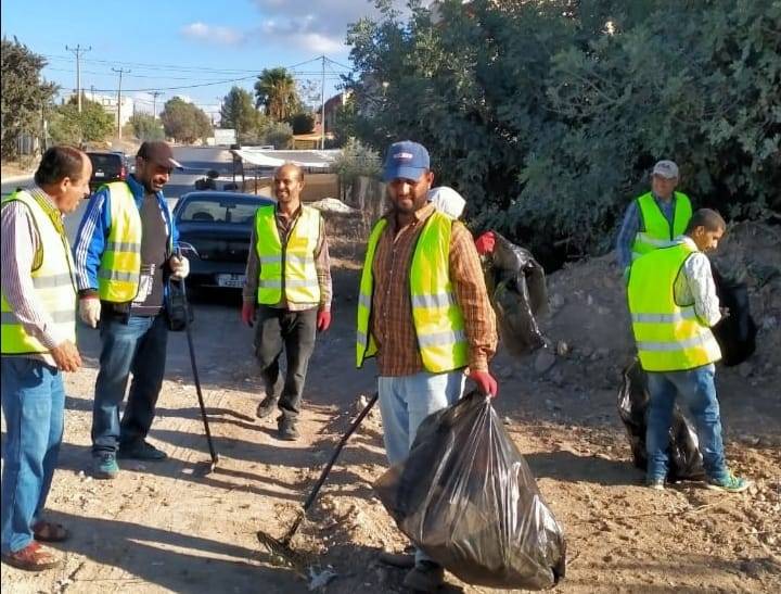 حملة نظافة بيئية تجسيدا للهوية الايمانية ومبادىء الاسلام في لواء بني كنانة  صور